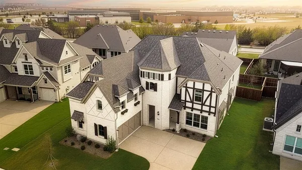 an aerial view of a house with a garden view