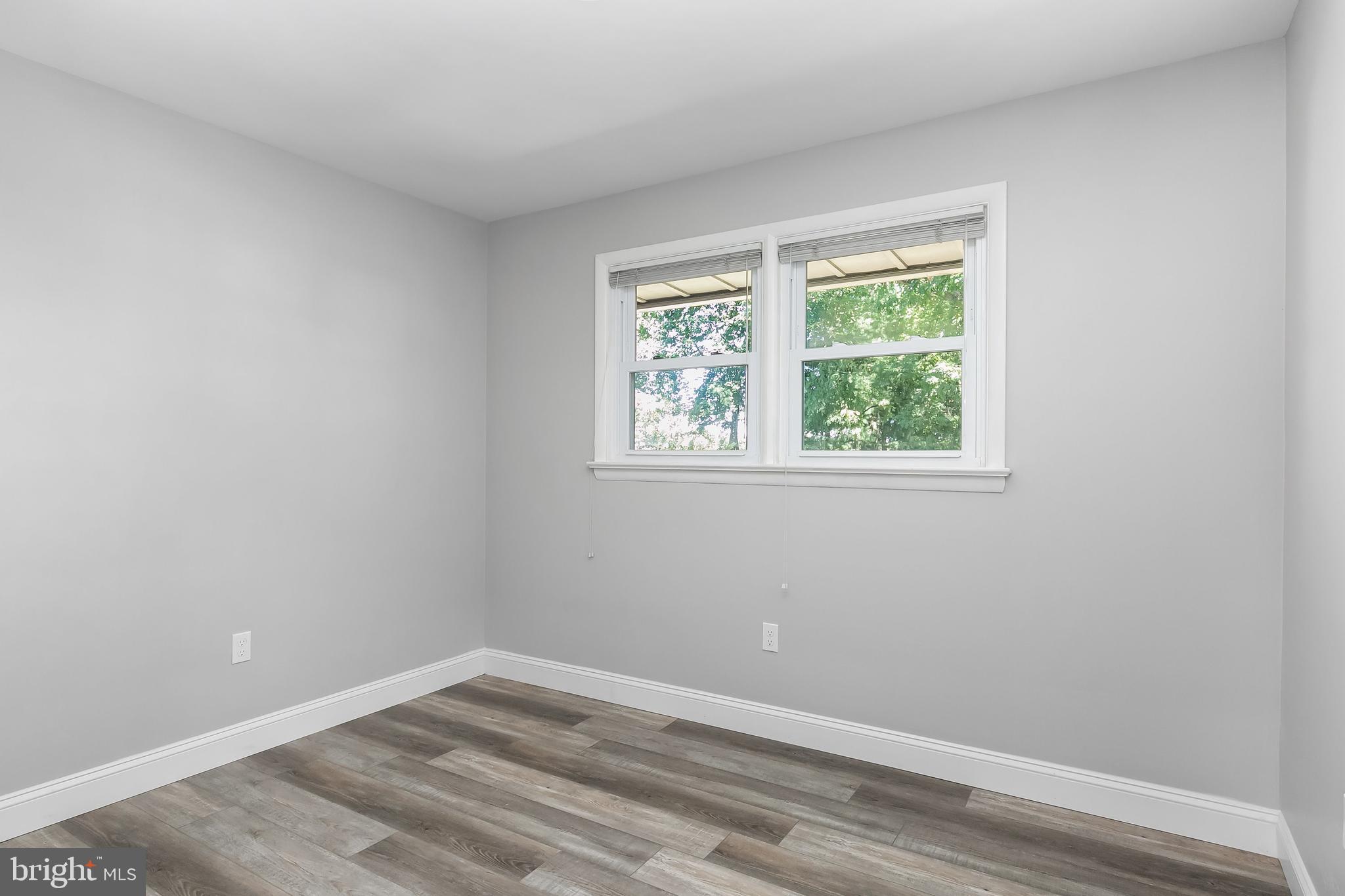405 Hamilton Road Glassboro, NJ 08028 - Photo 13 of 28 an empty room with a window