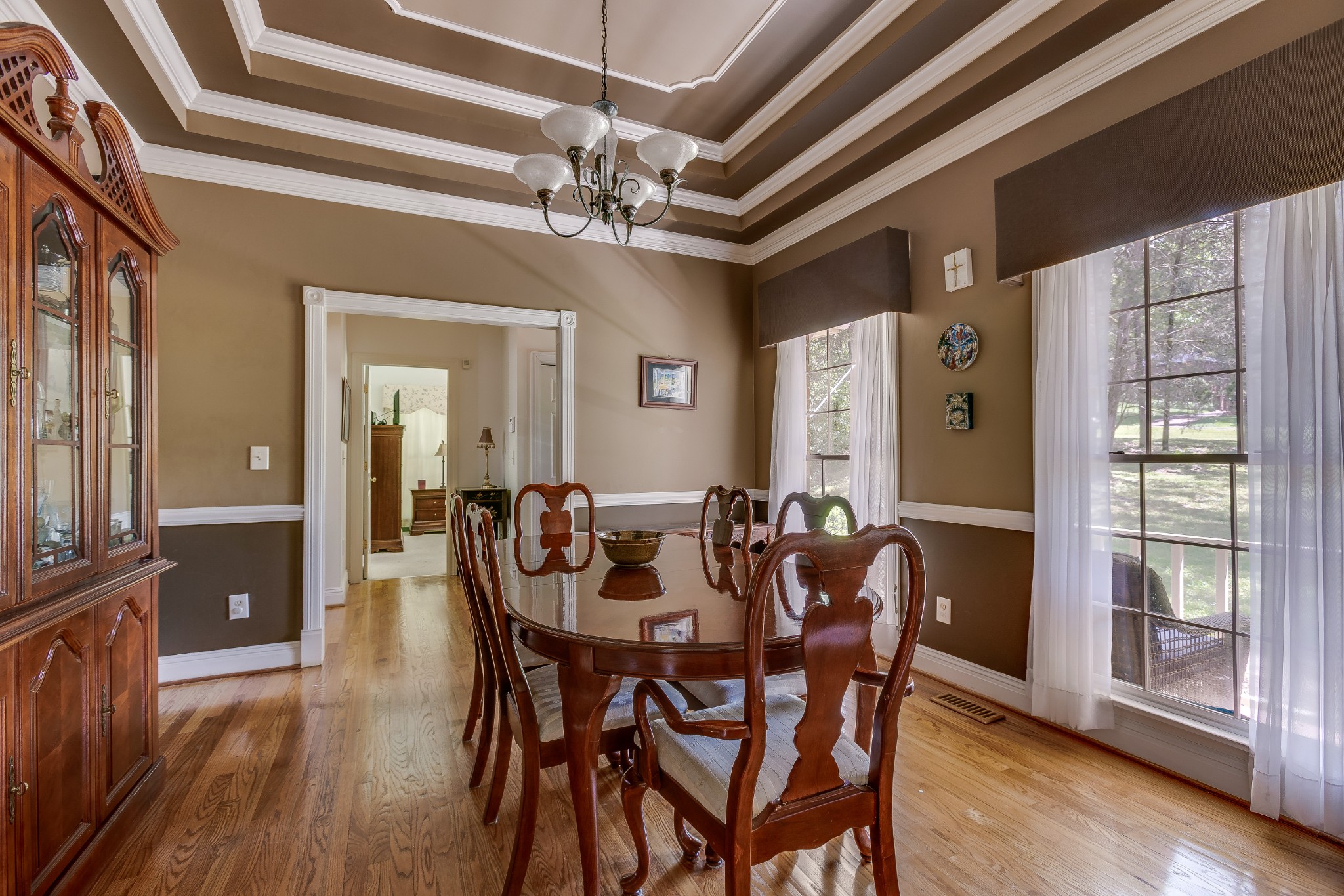 1111 Temple Ridge Court Nashville, TN 37221 - Photo 12 of 46 a view of a dining room with furniture window and wooden floor