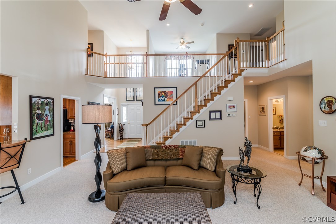 845 Club Ridge Court Chester, VA 23836 - Photo 19 of 37 a living room with furniture and a chandelier