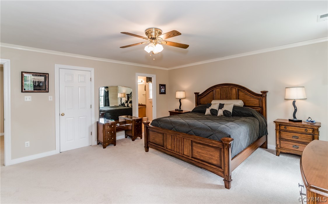 845 Club Ridge Court Chester, VA 23836 - Photo 29 of 37 a bedroom with a bed and wooden floor