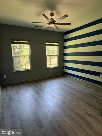 a bathroom with a toilet a sink and a shower