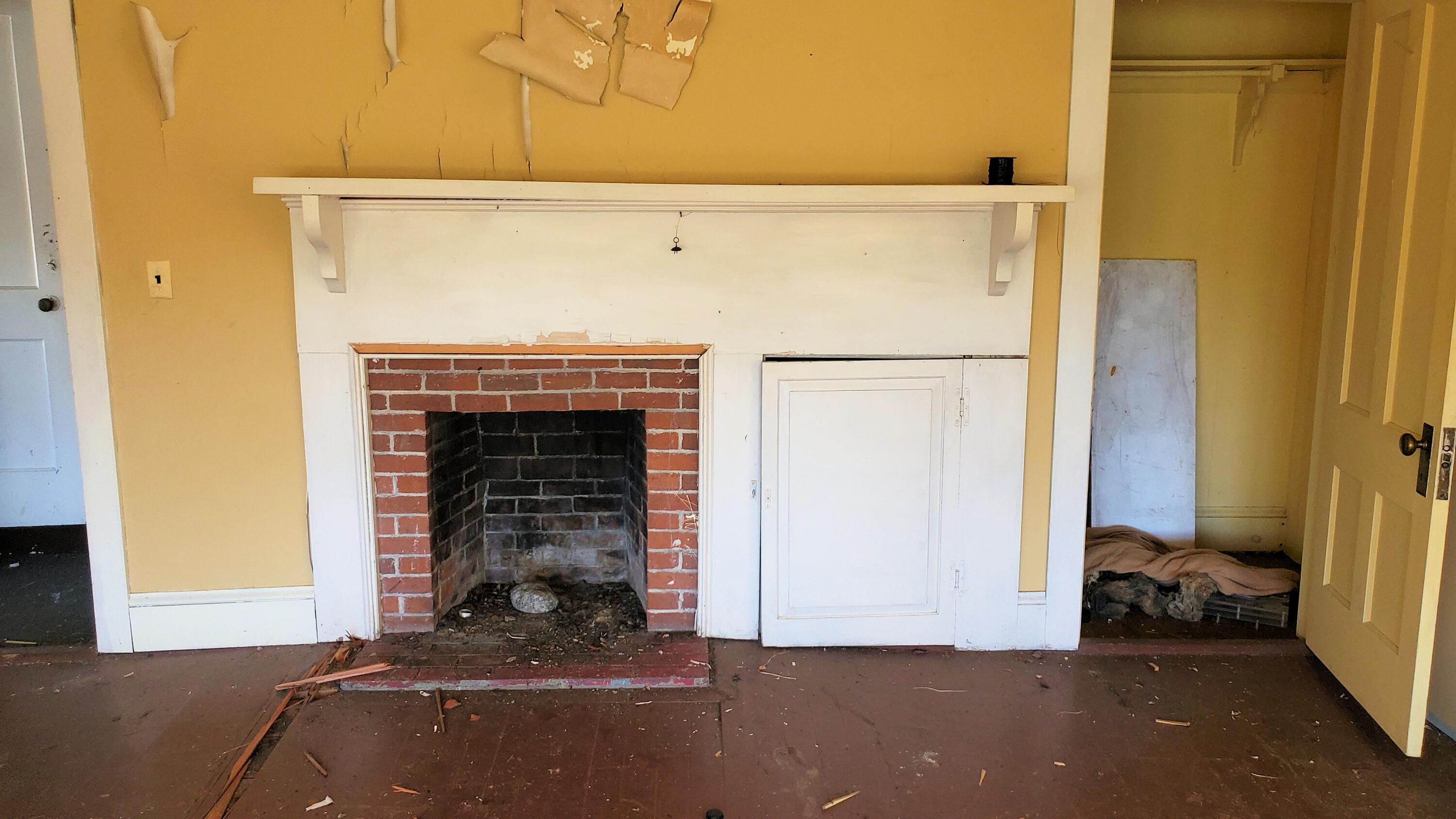 884 Surry Road Surry, ME 04684 - Photo 40 of 64 Living Area with Fireplace