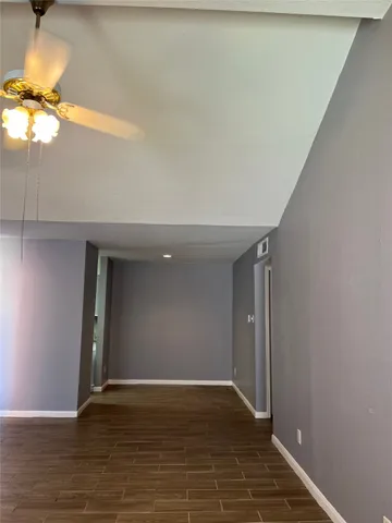 a view of an empty room and window