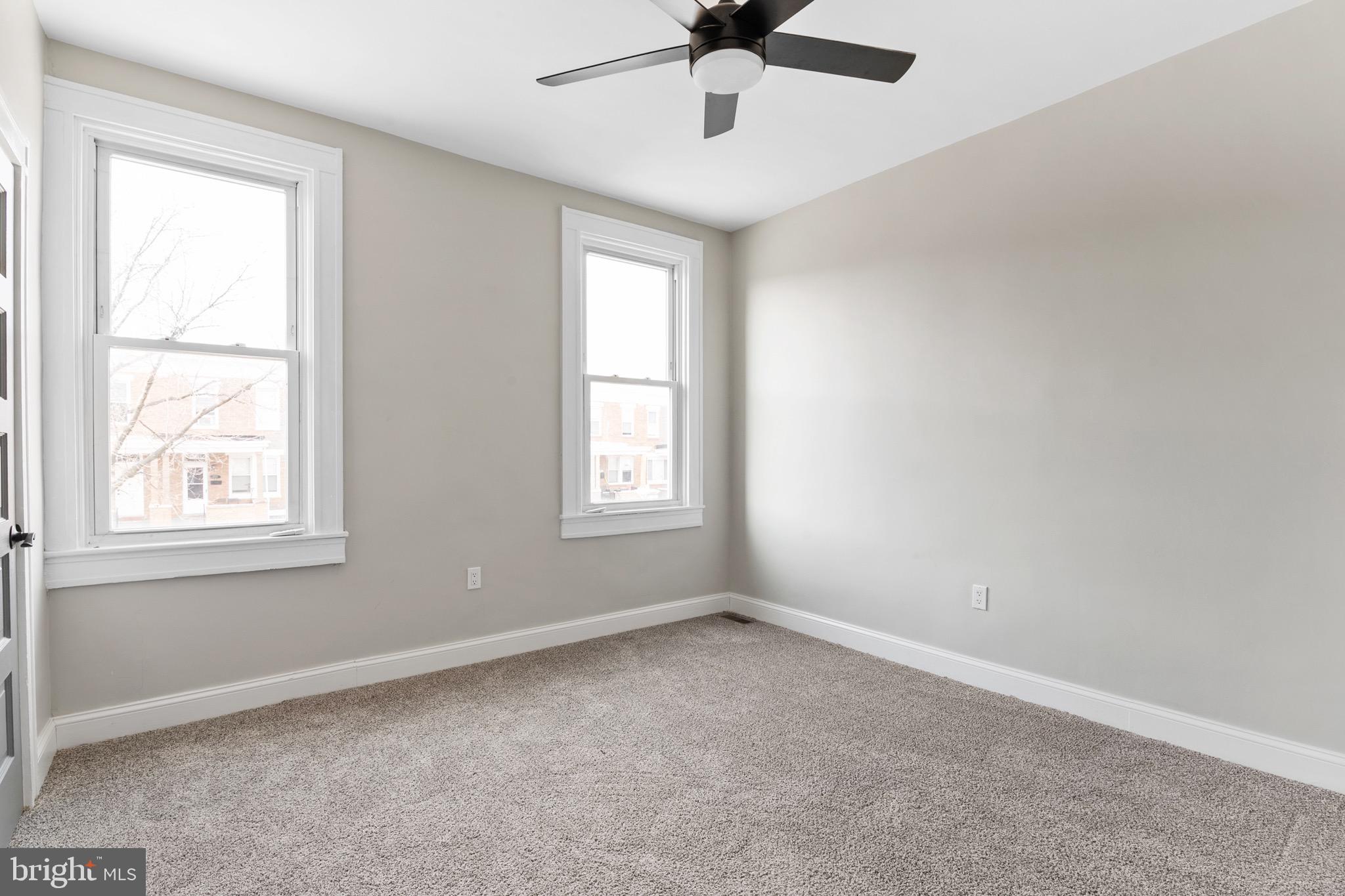 2828 Lake Avenue Baltimore, MD 21213 - Photo 13 of 28 a view of an empty room with a window