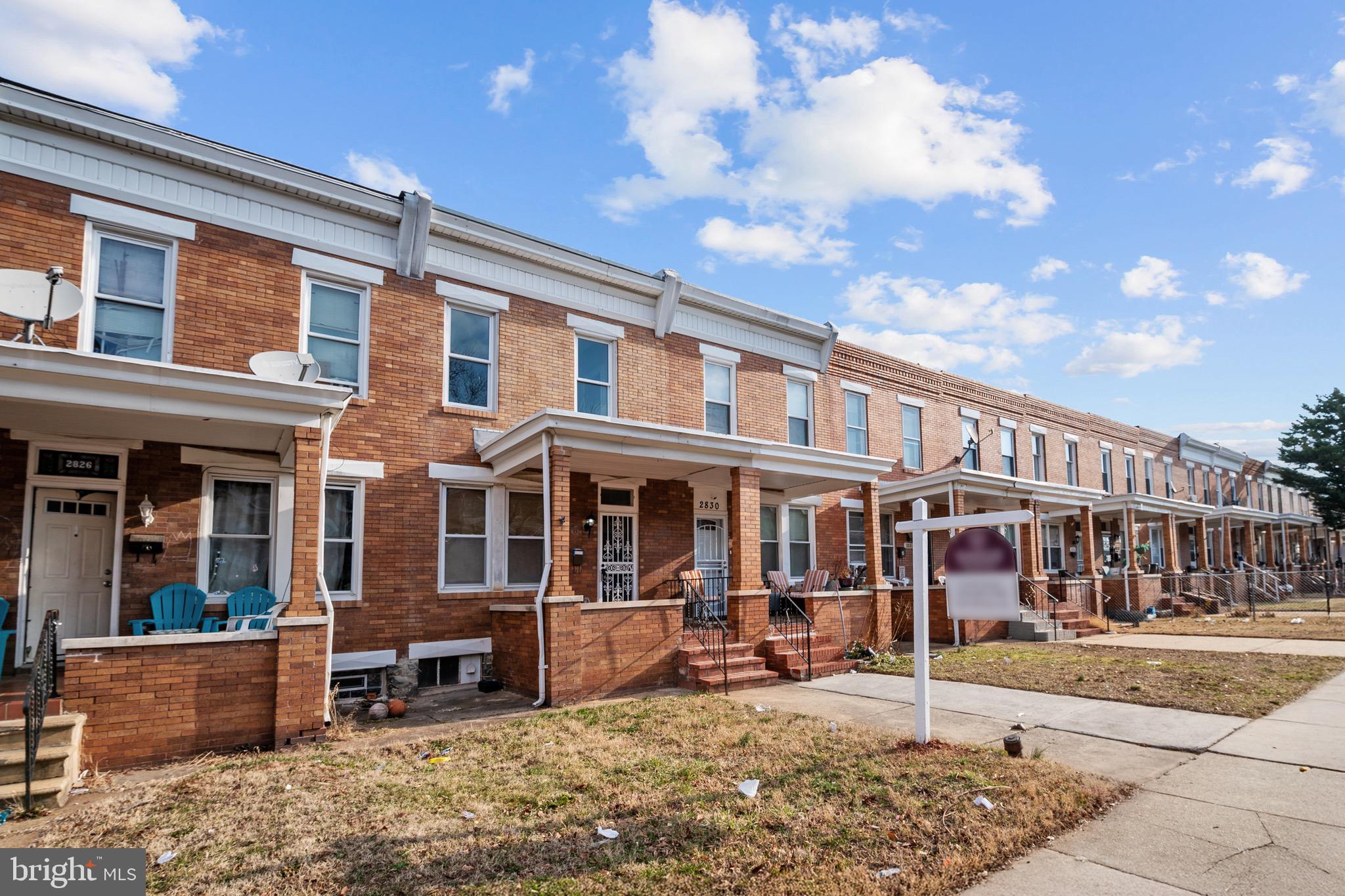 2828 Lake Avenue Baltimore, MD 21213 - Photo 2 of 28 a view of a brick building with many windows
