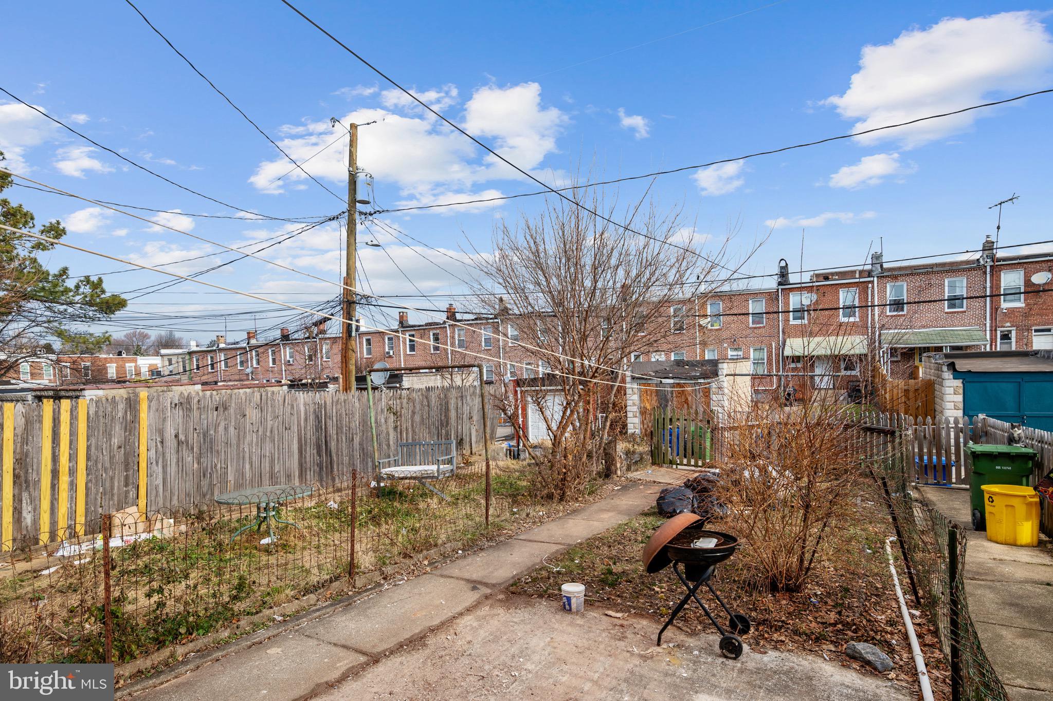 2828 Lake Avenue Baltimore, MD 21213 - Photo 26 of 28 a view of a chairs and table in patio