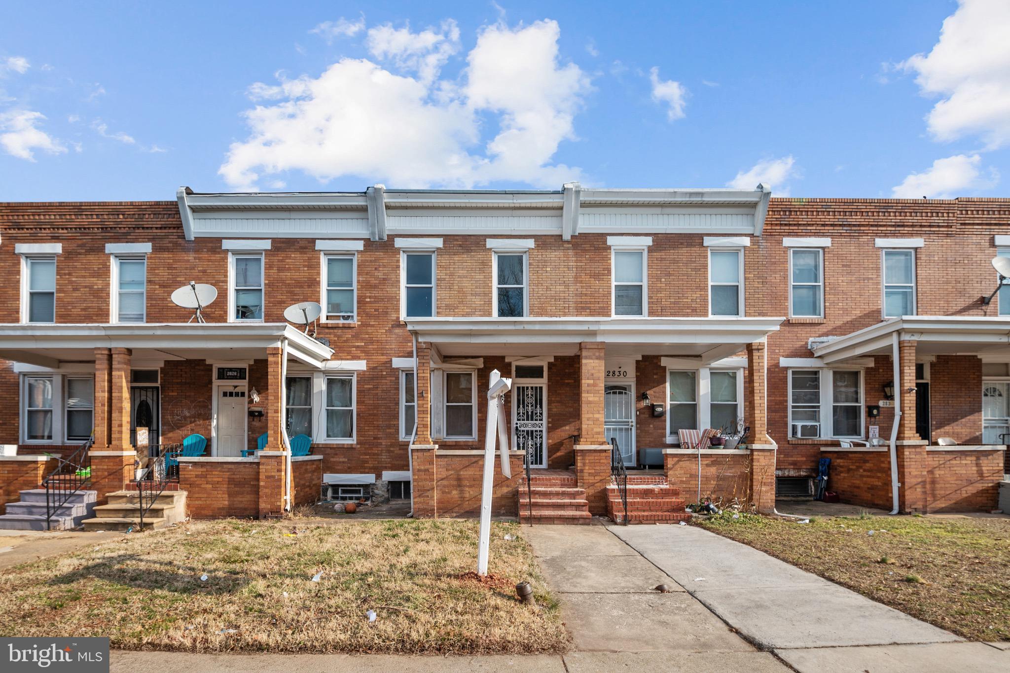 2828 Lake Avenue Baltimore, MD 21213 - Photo 28 of 28 a view of a brick building with many windows