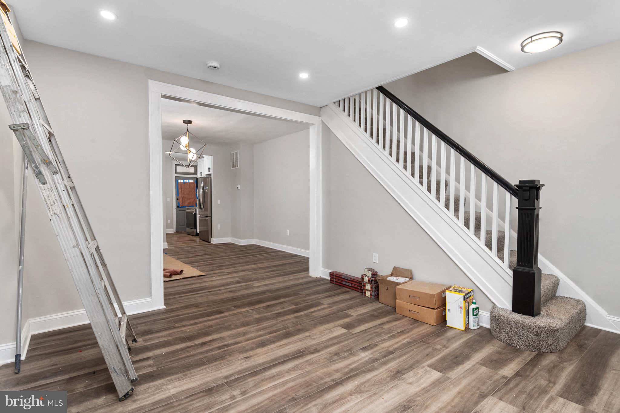 2828 Lake Avenue Baltimore, MD 21213 - Photo 3 of 28 a view of entryway and hall with wooden floor