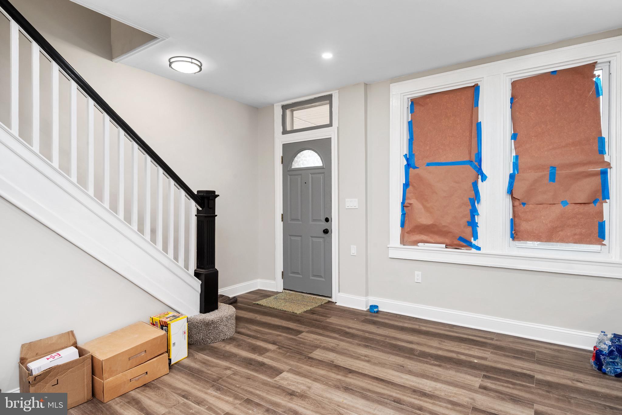 2828 Lake Avenue Baltimore, MD 21213 - Photo 5 of 28 a view of an entryway with wooden floor and door