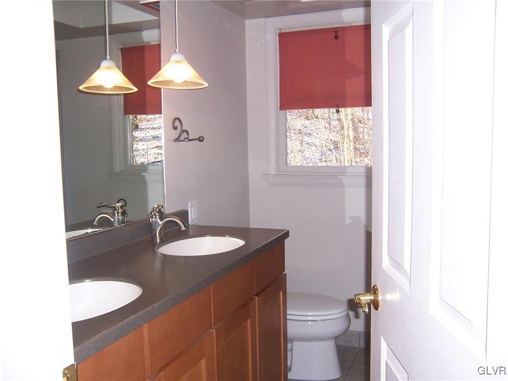 6901 Sell Road Zionsville, PA 18092 - Photo 32 of 33 updated main hallway bath on 2nd floor