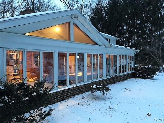 6901 Sell Road Zionsville, PA 18092 - Photo 6 of 33 walls of windows for a beautiful nature backdrop.