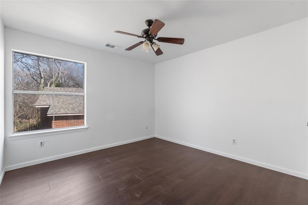 225 Freedom Court Rockwall, TX 75032 - Photo 19 of 28 an empty room with a window