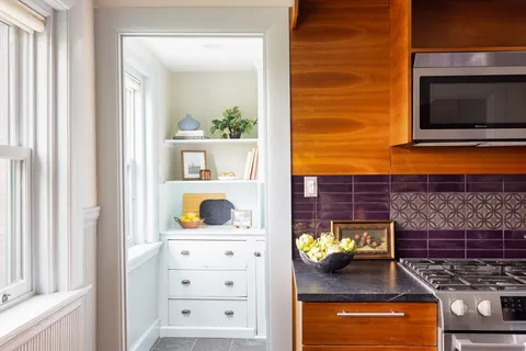 a view of an oven and a microwave