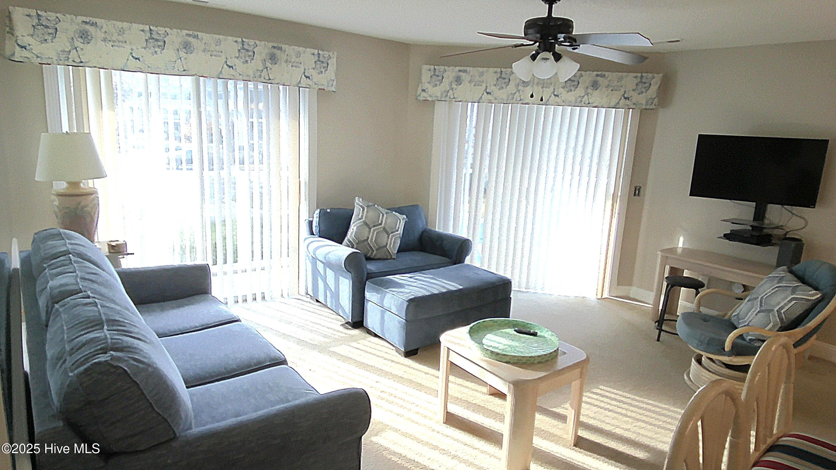 908 Resort Circle, Unit 108 Sunset Beach, NC 28468 - Photo 19 of 36 livingroom from hall
