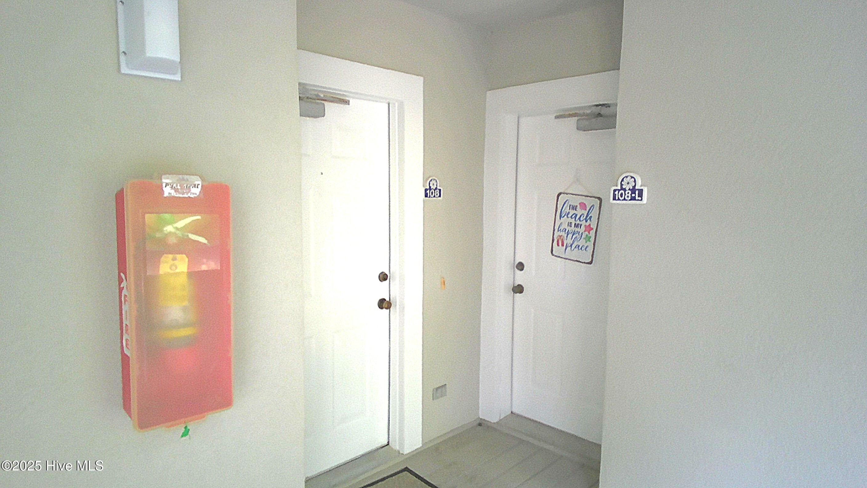 908 Resort Circle, Unit 108 Sunset Beach, NC 28468 - Photo 4 of 36 front and side doors