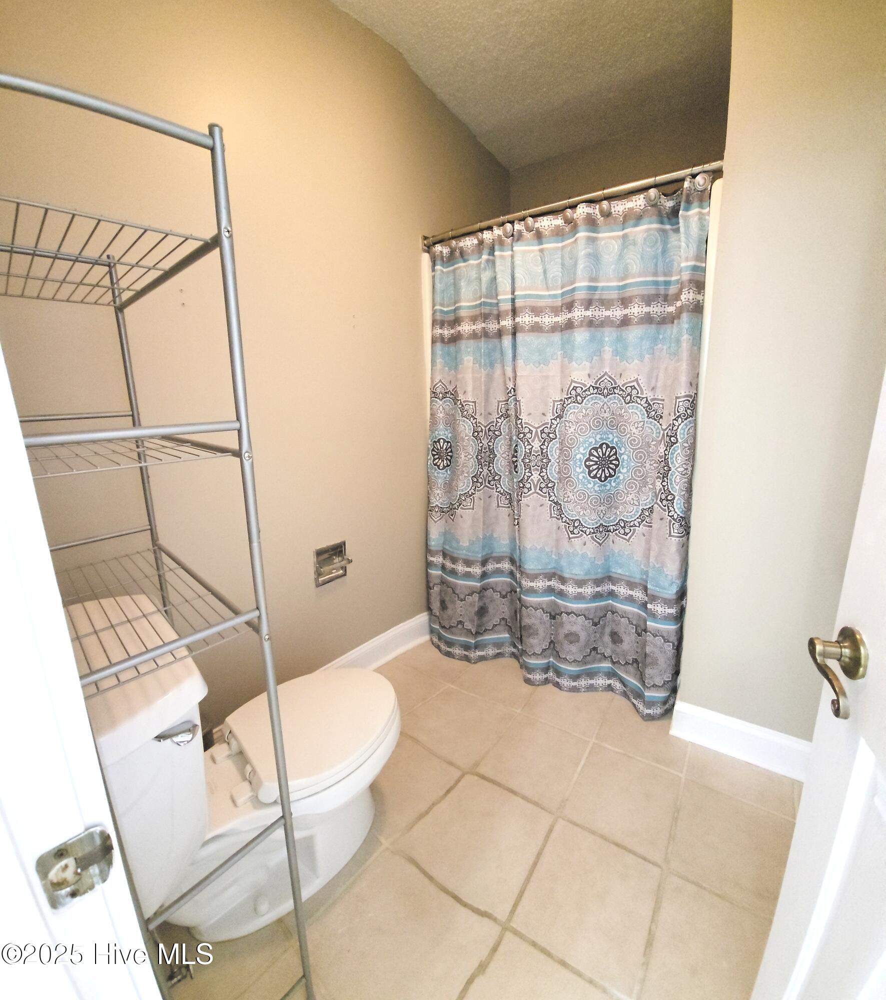 908 Resort Circle, Unit 108 Sunset Beach, NC 28468 - Photo 10 of 36 lockout suite bath