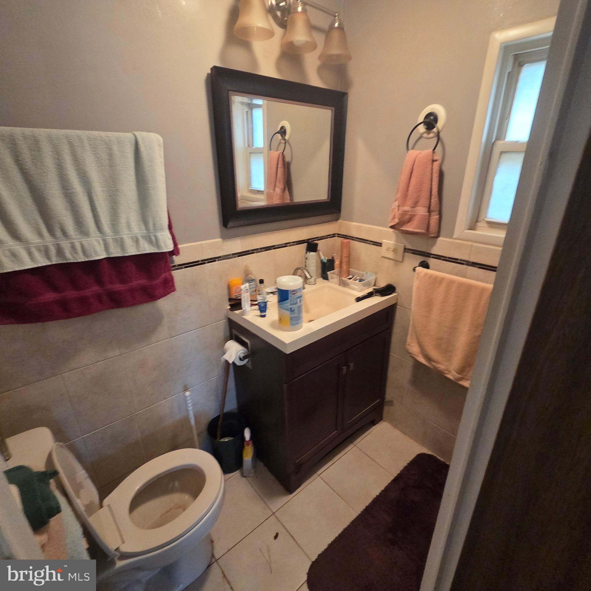 12623 Shell Mill Road, Unit 123 Bishopville, MD 21813 - Photo 8 of 15 a bathroom with a sink and a mirror