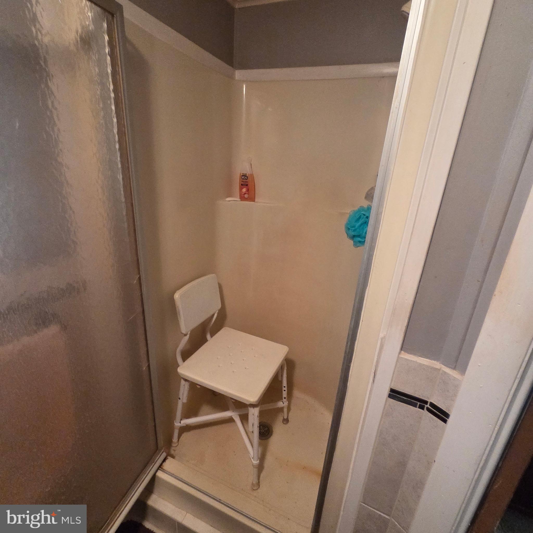 12623 Shell Mill Road, Unit 123 Bishopville, MD 21813 - Photo 9 of 15 a bathroom with a toilet and a shower