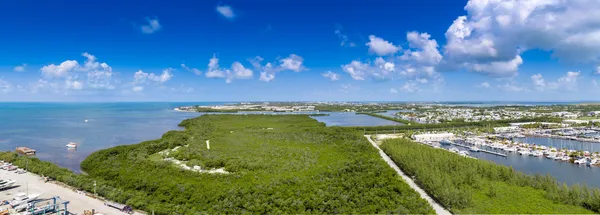 a view of a lake in the sunset