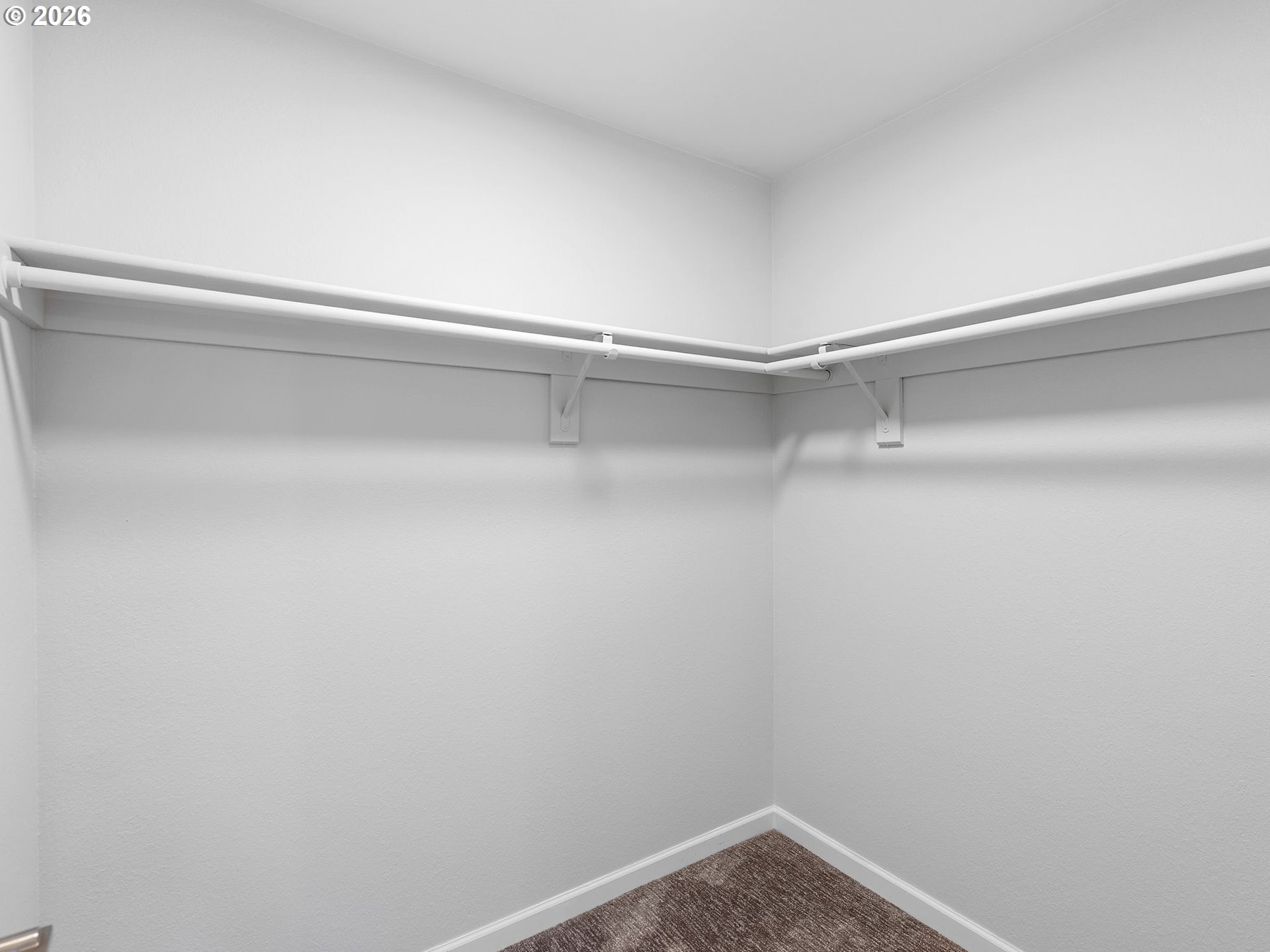 9370 Southwest 146th Terrace, Unit N5 Beaverton, OR 97007 - Photo 18 of 35 a view of a room with racks on the wall