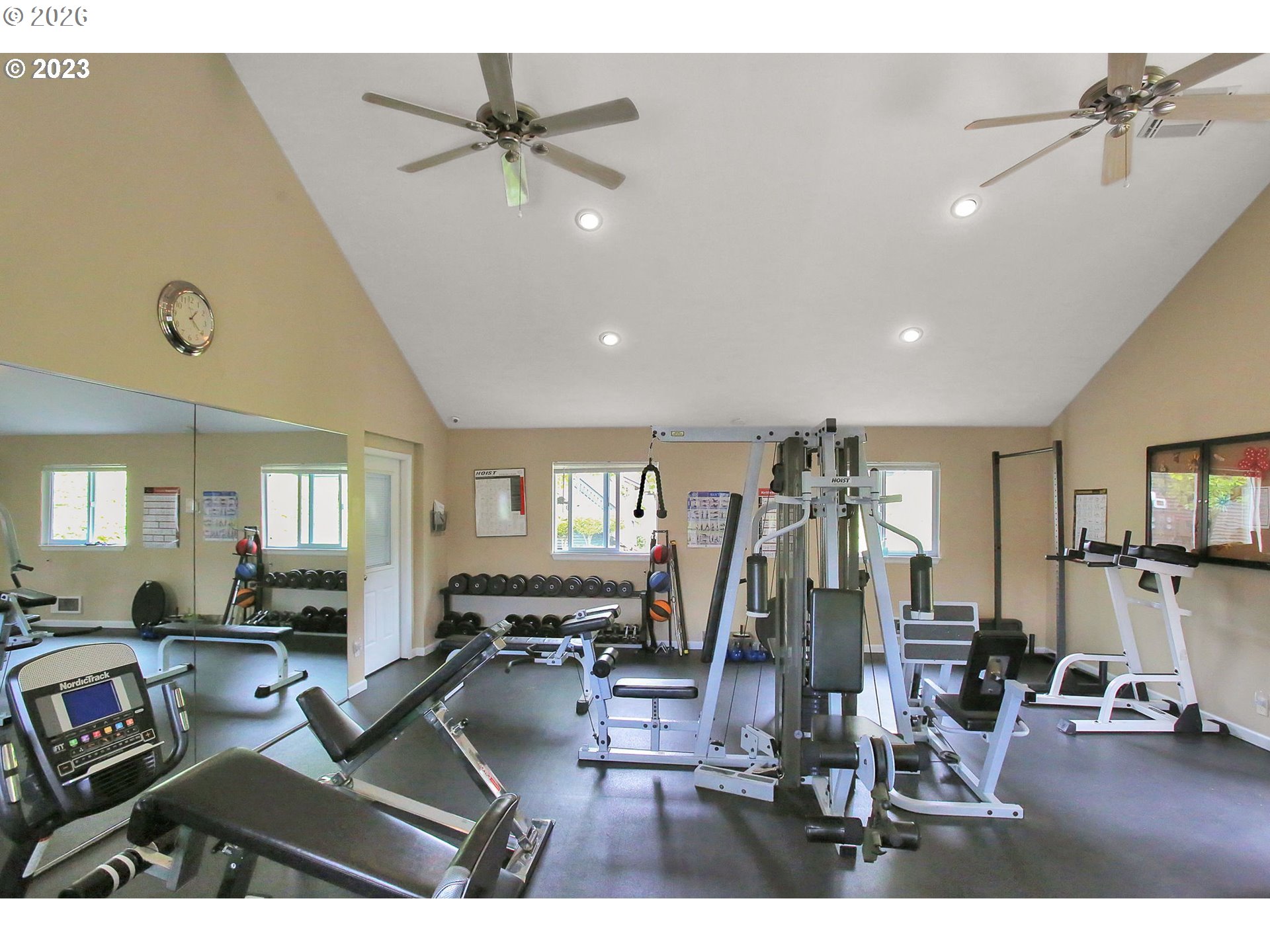 9370 Southwest 146th Terrace, Unit N5 Beaverton, OR 97007 - Photo 33 of 35 a view of a livingroom with furniture and a flat screen tv
