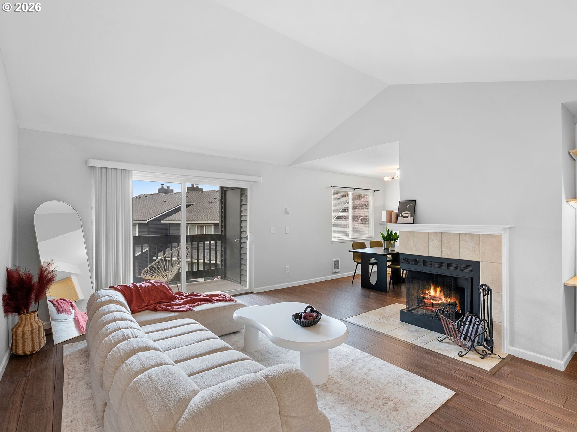 9370 Southwest 146th Terrace, Unit N5 Beaverton, OR 97007 - Photo 4 of 35 a living room with furniture and a fireplace
