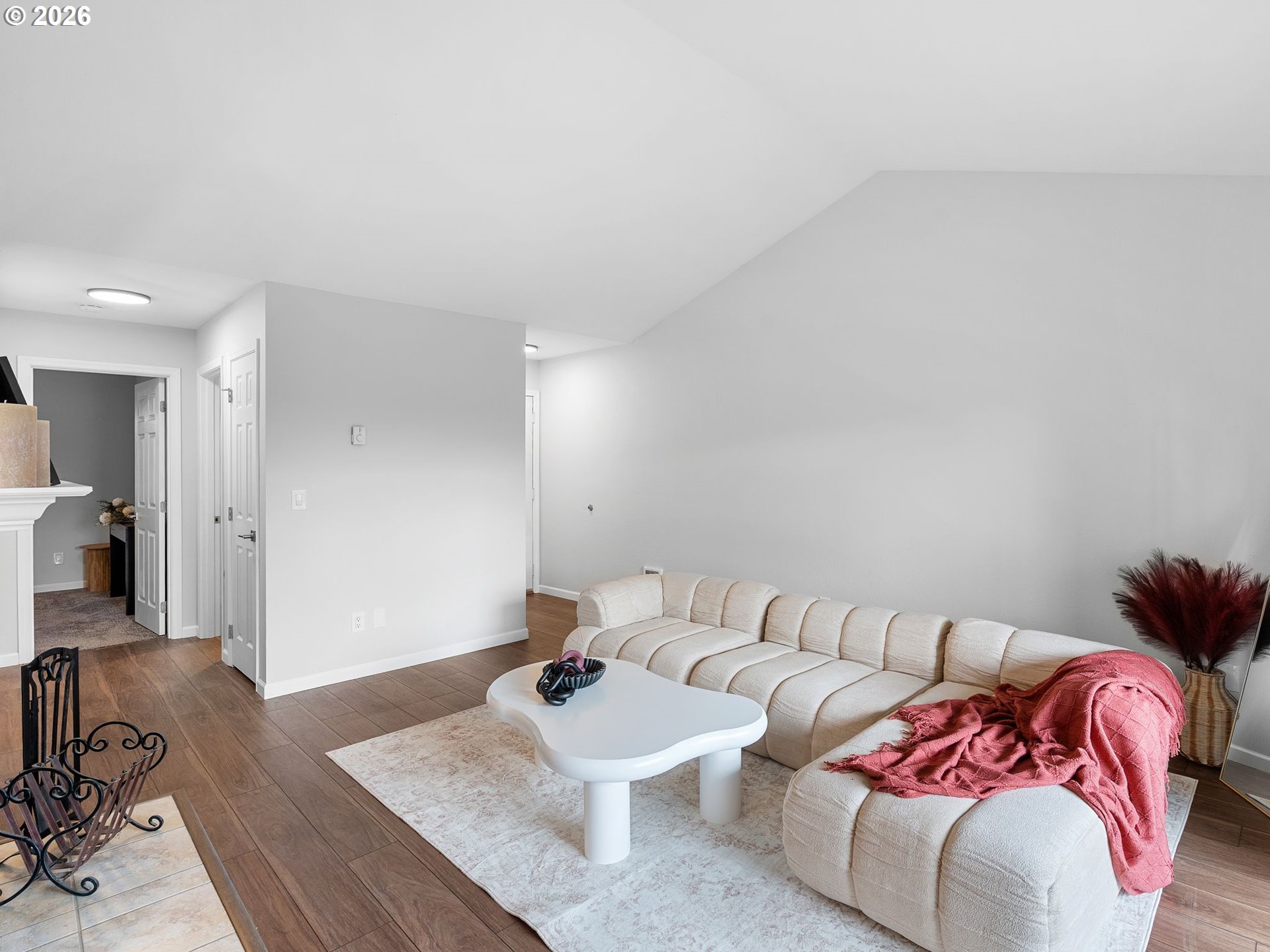 9370 Southwest 146th Terrace, Unit N5 Beaverton, OR 97007 - Photo 6 of 35 a living room with furniture and a wooden floor