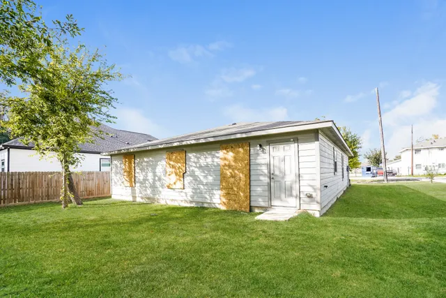 a view of a house with a big yard