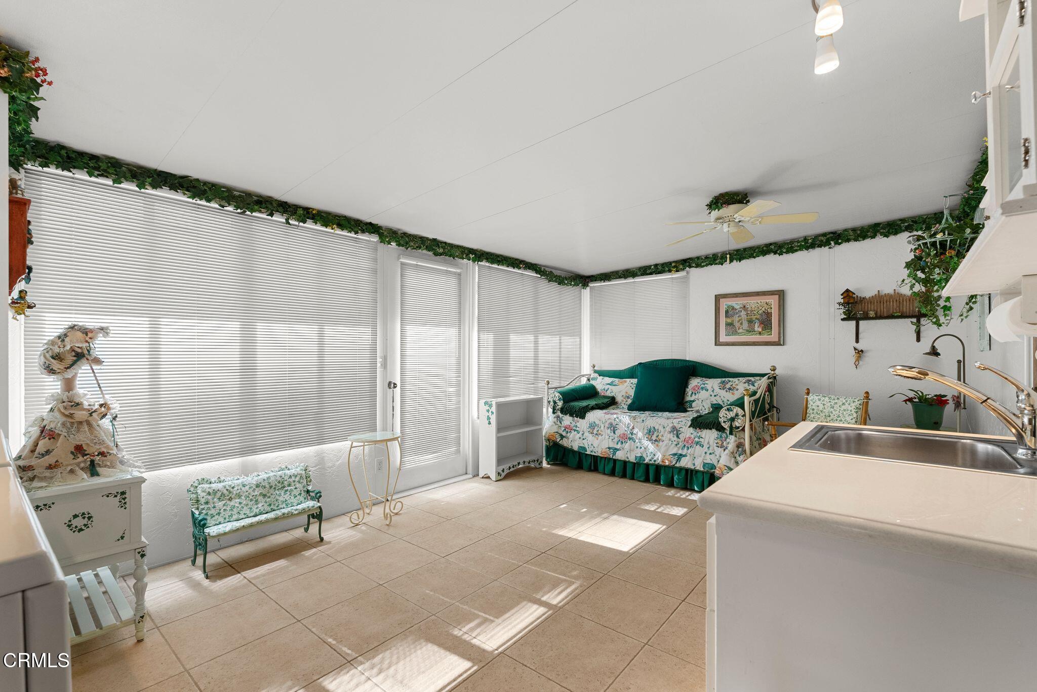 830 South Rice Road Ojai, CA 93023 - Photo 23 of 39 a bedroom with furniture and a large window
