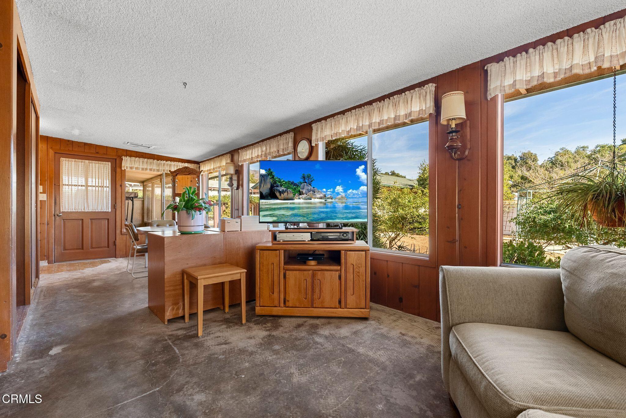 830 South Rice Road Ojai, CA 93023 - Photo 27 of 39 a living room with furniture and a large window
