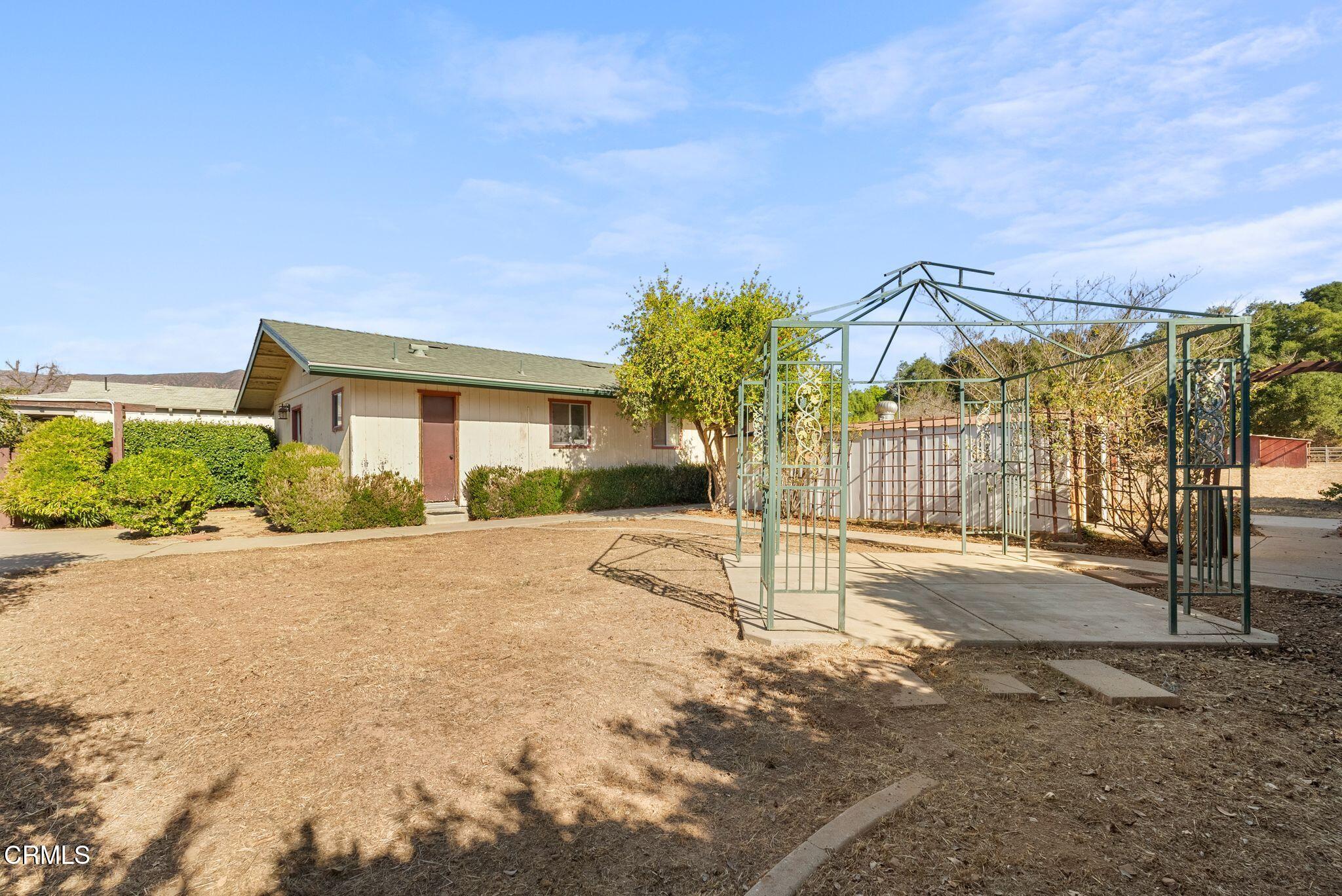 830 South Rice Road Ojai, CA 93023 - Photo 33 of 39 a house with trees in front of it
