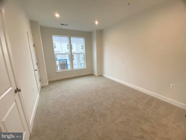 a bathroom with a shower and a toilet