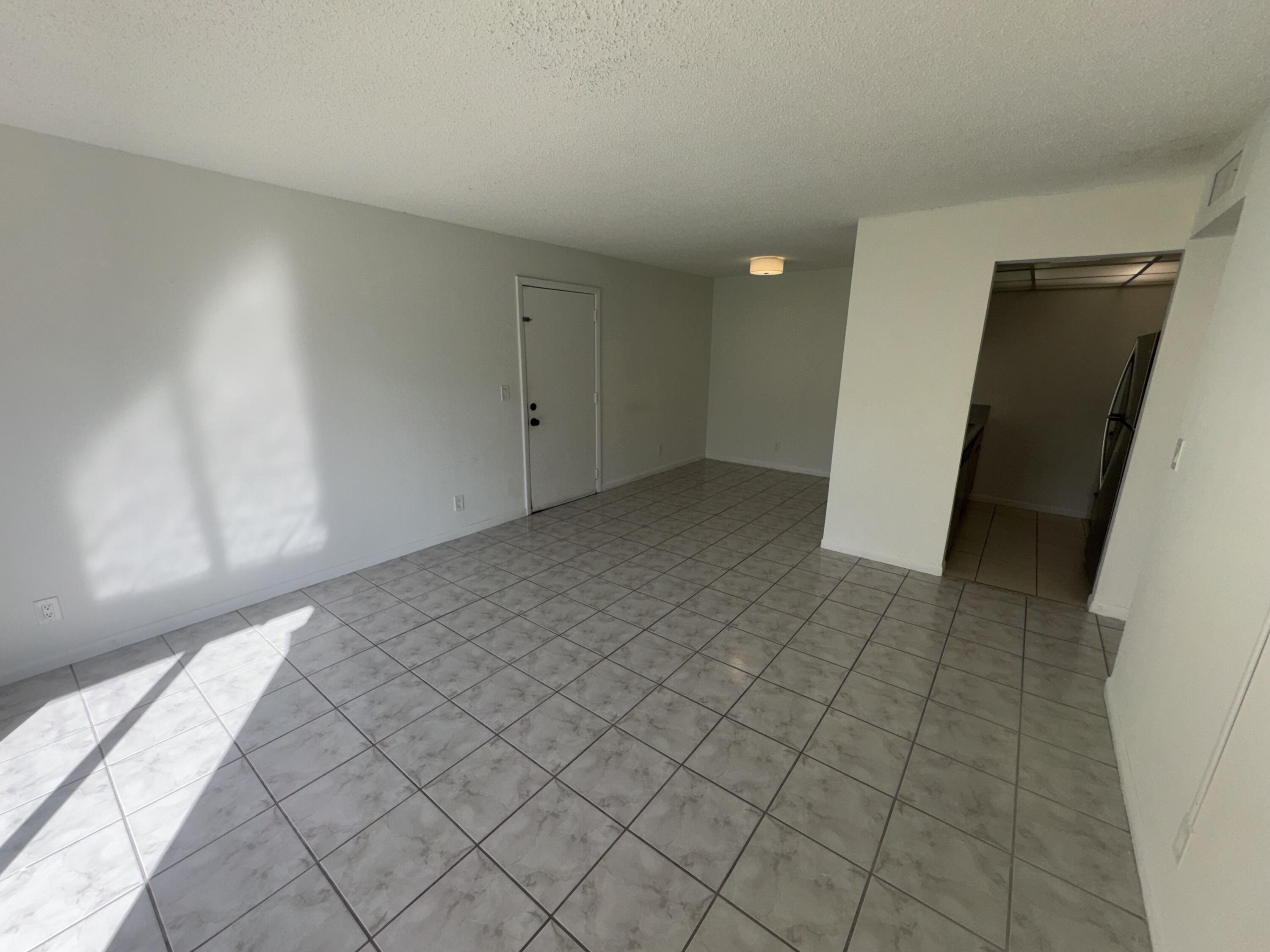 1854 Abbey Road, Unit 102 West Palm Beach, FL 33415 - Photo 14 of 26 Living Space