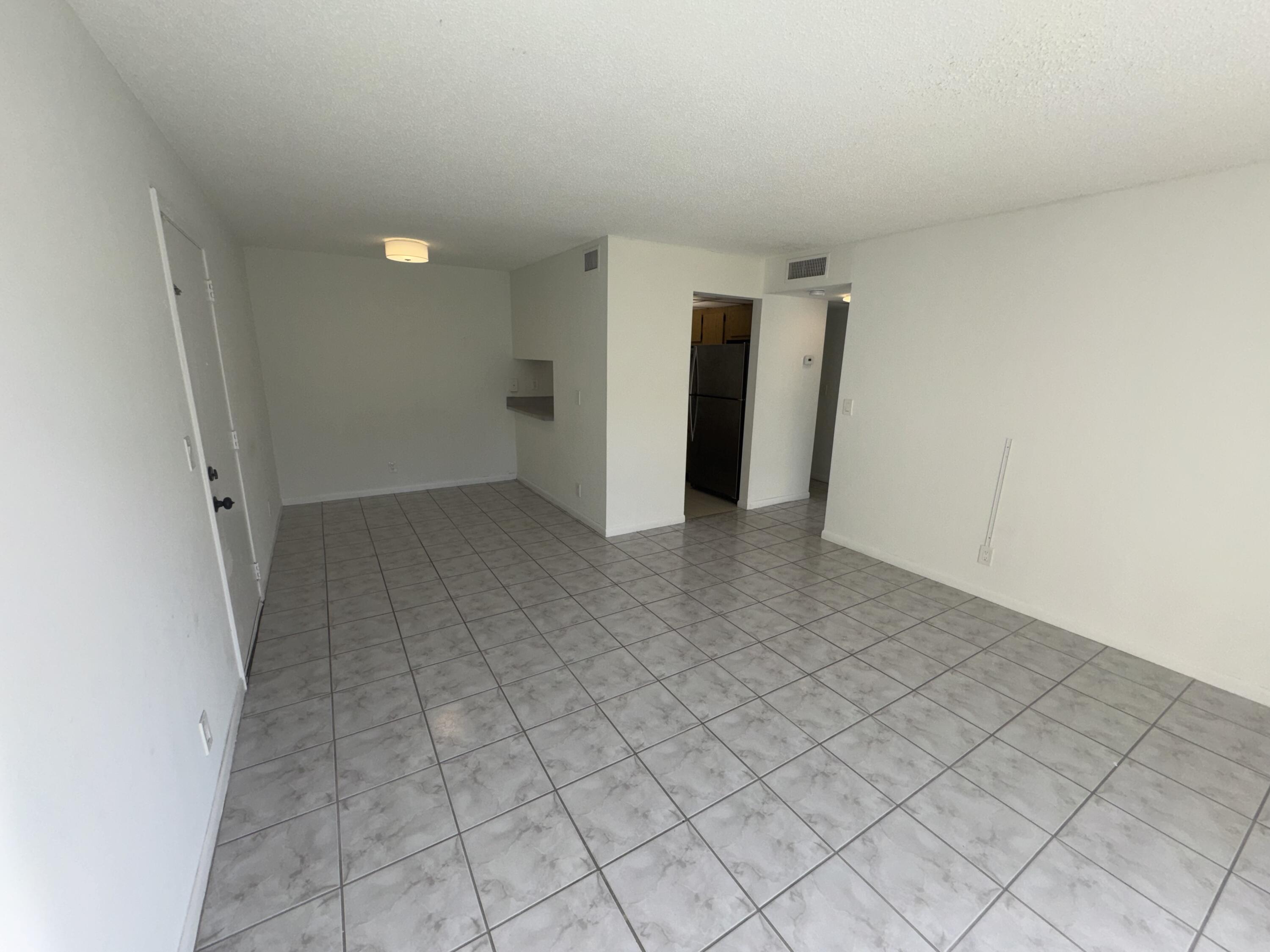 1854 Abbey Road, Unit 102 West Palm Beach, FL 33415 - Photo 15 of 26 Living Space