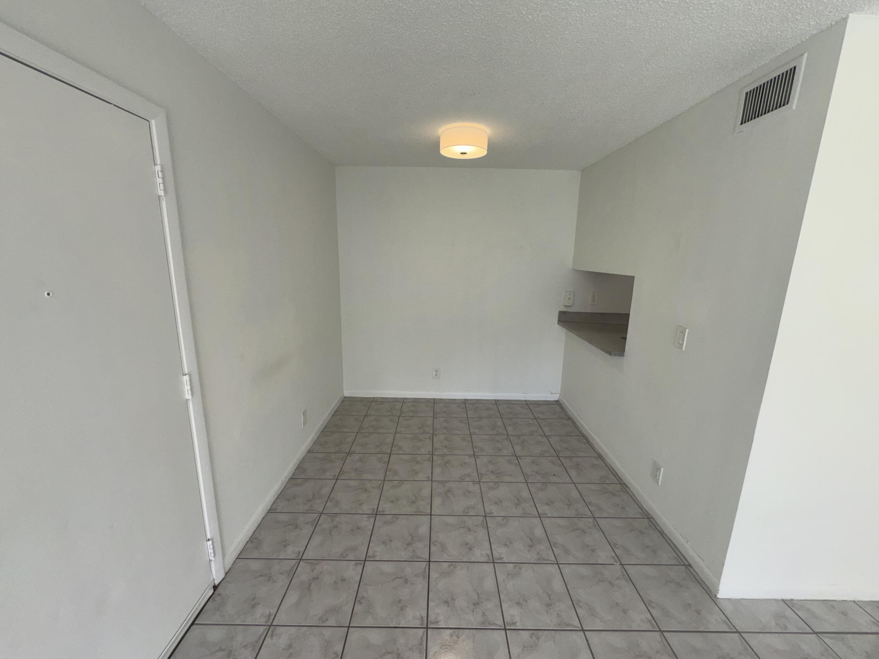 1854 Abbey Road, Unit 102 West Palm Beach, FL 33415 - Photo 16 of 26 Living Space