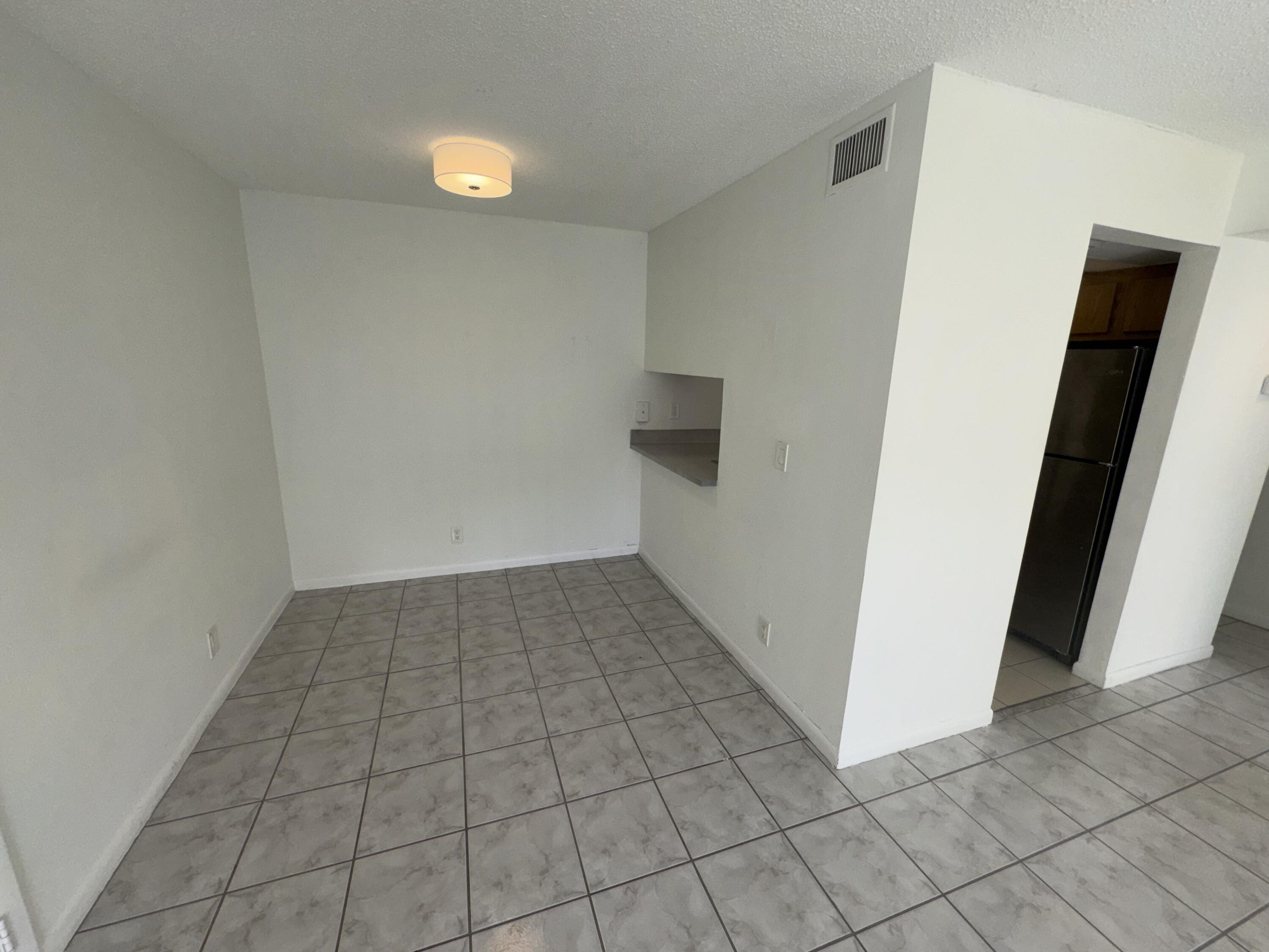 1854 Abbey Road, Unit 102 West Palm Beach, FL 33415 - Photo 17 of 26 Living Space