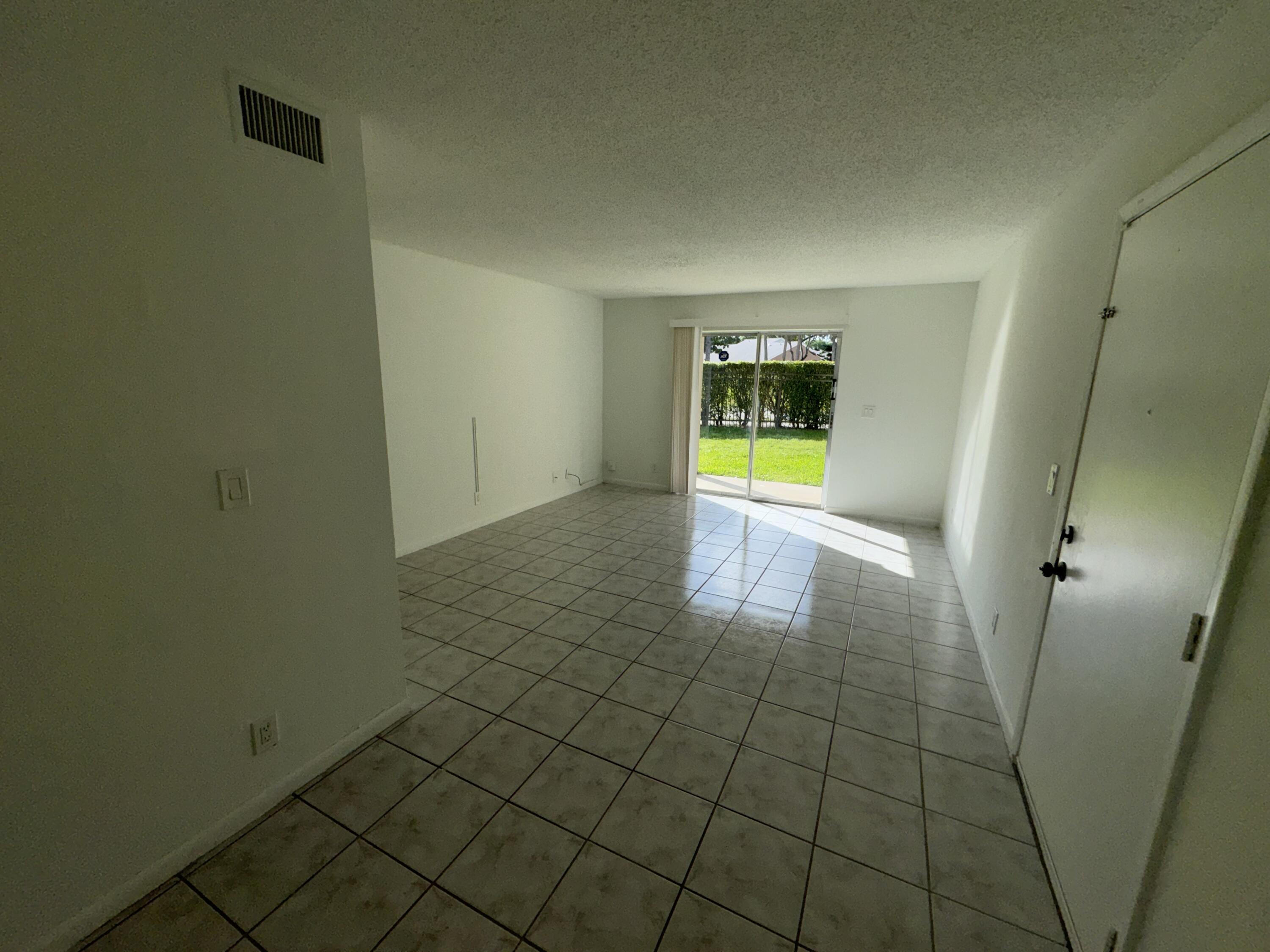1854 Abbey Road, Unit 102 West Palm Beach, FL 33415 - Photo 18 of 26 Living Space