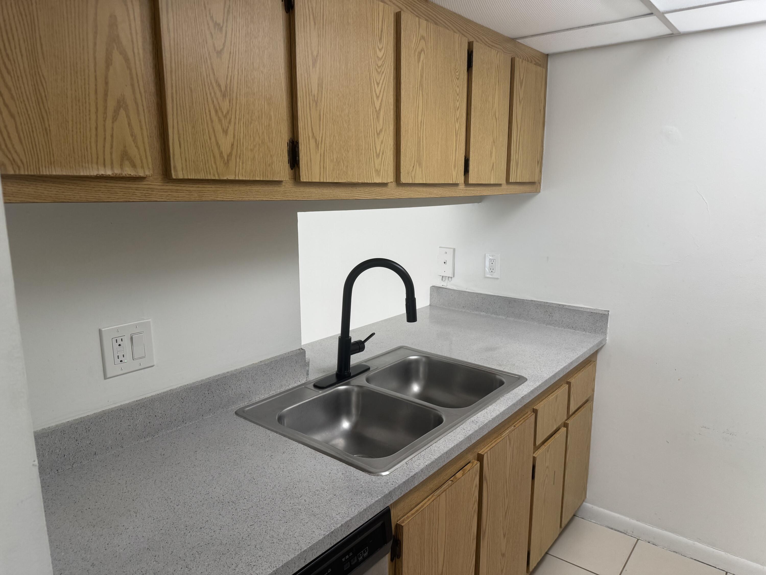 1854 Abbey Road, Unit 102 West Palm Beach, FL 33415 - Photo 2 of 26 Kitchen Galley