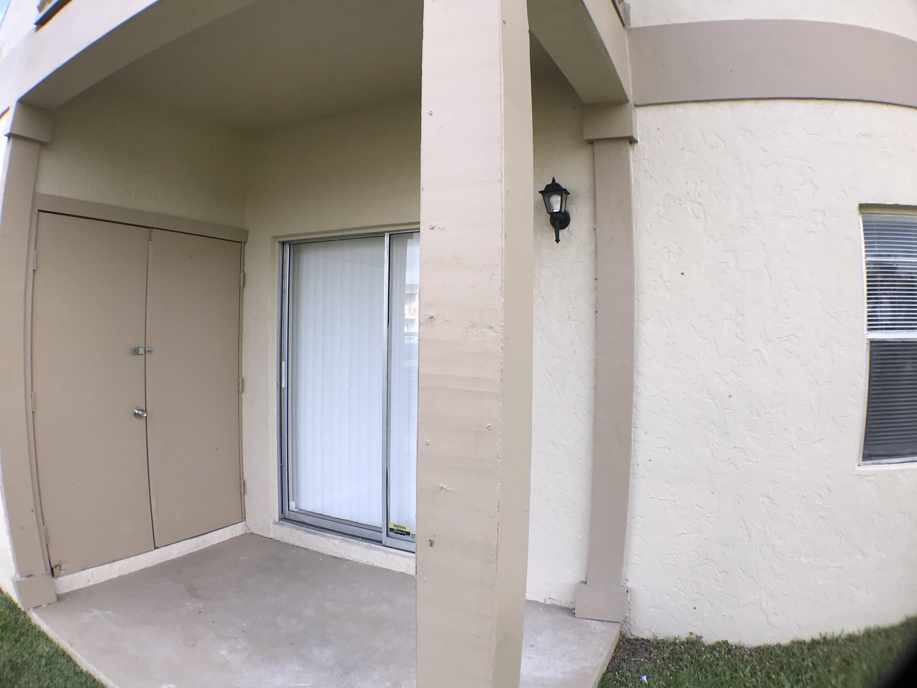 1854 Abbey Road, Unit 102 West Palm Beach, FL 33415 - Photo 21 of 26 Open Patio