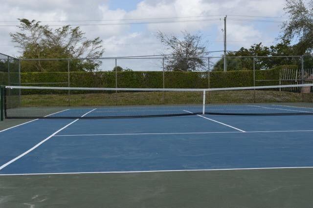 1854 Abbey Road, Unit 102 West Palm Beach, FL 33415 - Photo 23 of 26 Community Tennis Court Area