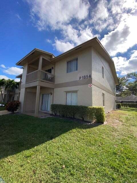 1854 Abbey Road, Unit 102 West Palm Beach, FL 33415 - Photo 24 of 26 Exterior of Building
