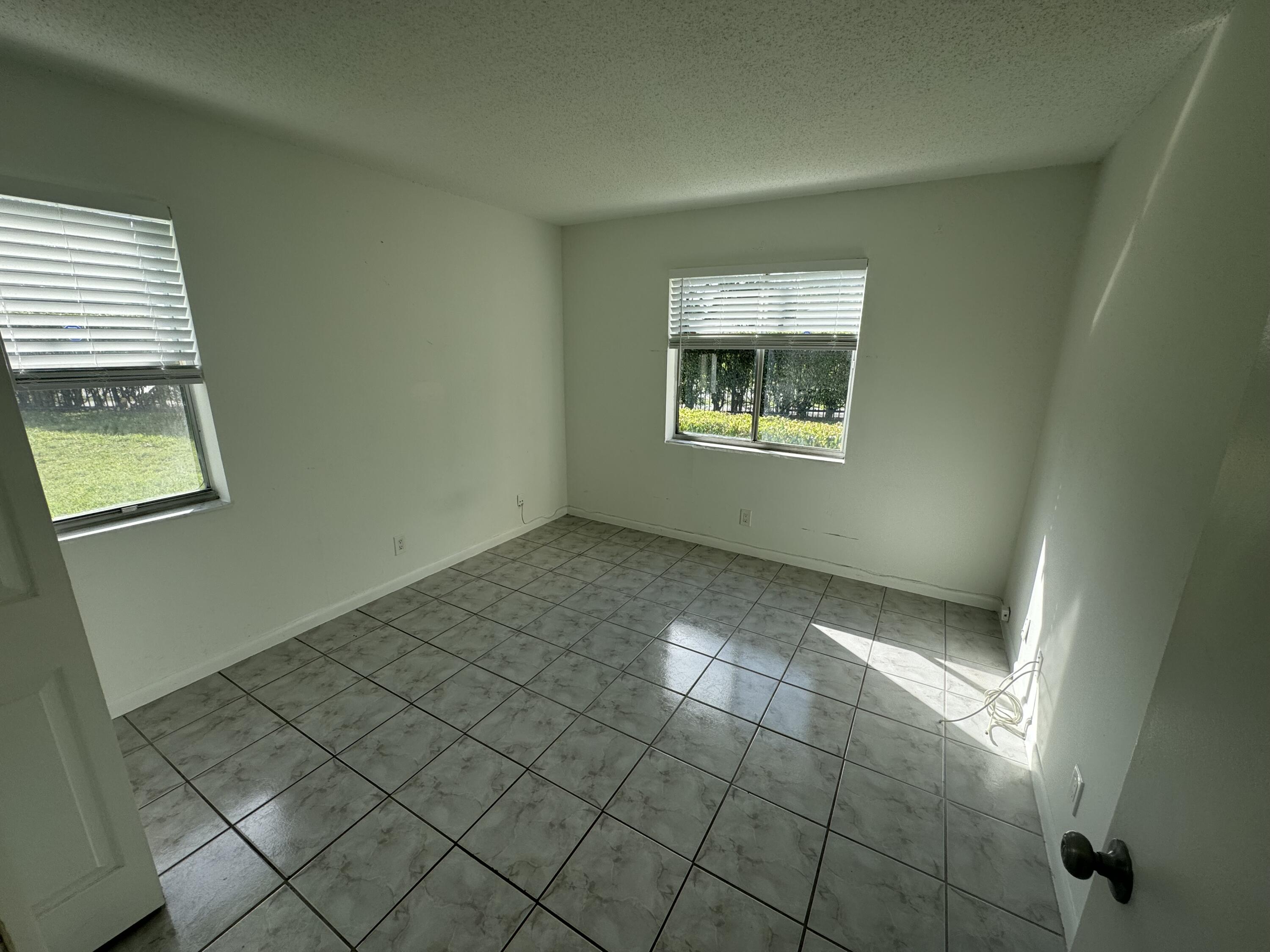 1854 Abbey Road, Unit 102 West Palm Beach, FL 33415 - Photo 7 of 26 Bedroom