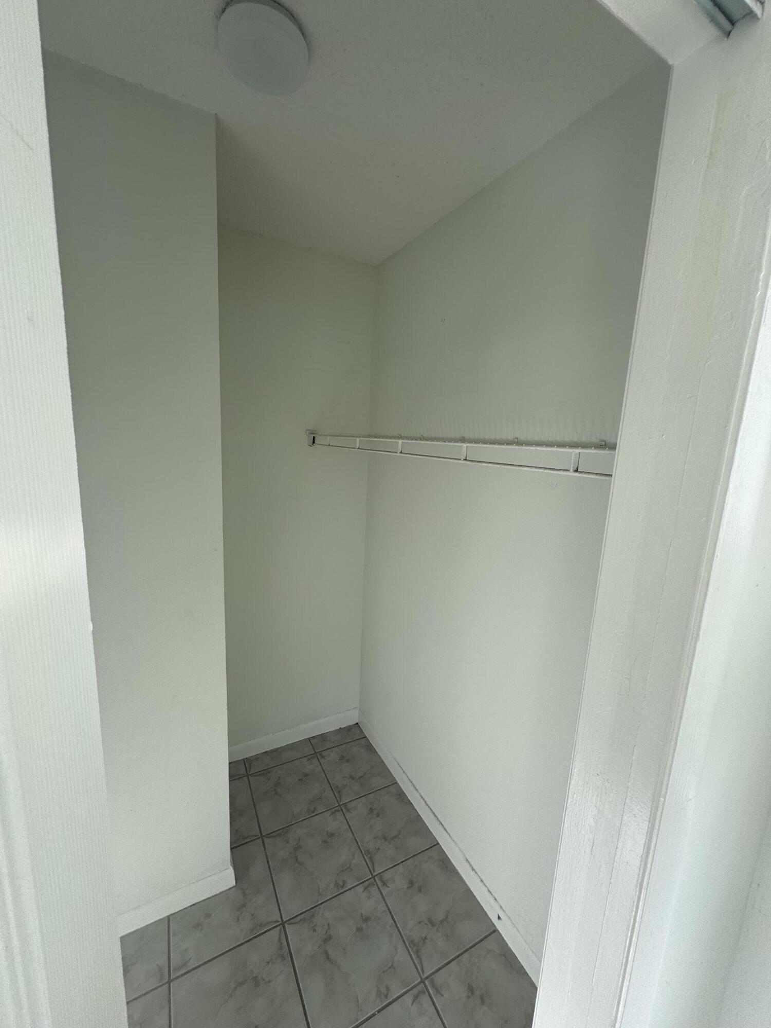 1854 Abbey Road, Unit 102 West Palm Beach, FL 33415 - Photo 9 of 26 Bedroom Closet