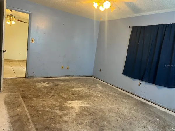 a view of room and an empty room