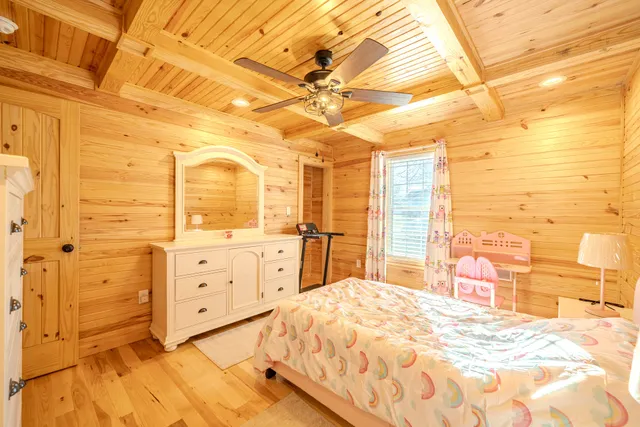 a bedroom with a bed and a cabinets