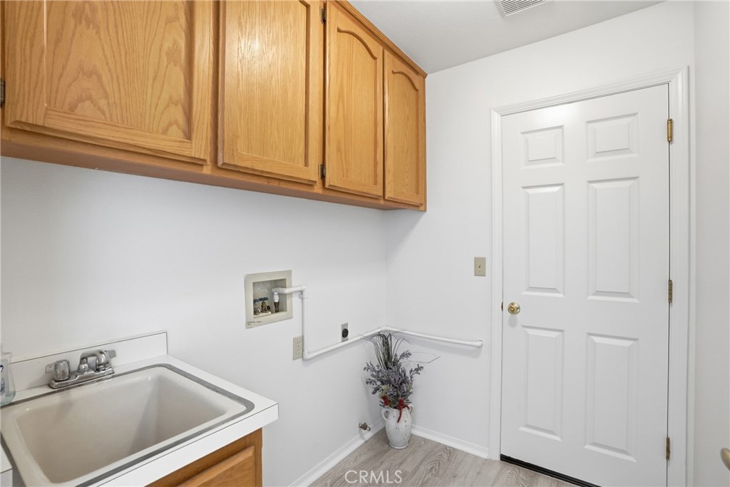 3361 Marshall Lane Lompoc, CA 93436 - Photo 27 of 35 Laundry with utility sink, extra storage + gas & 220 service
