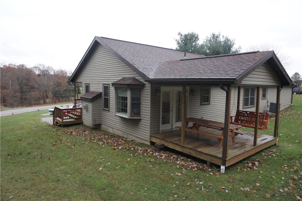 776 County Line Road Acme, PA 15610 - Photo 22 of 25 Back porch. French doors from dining area.