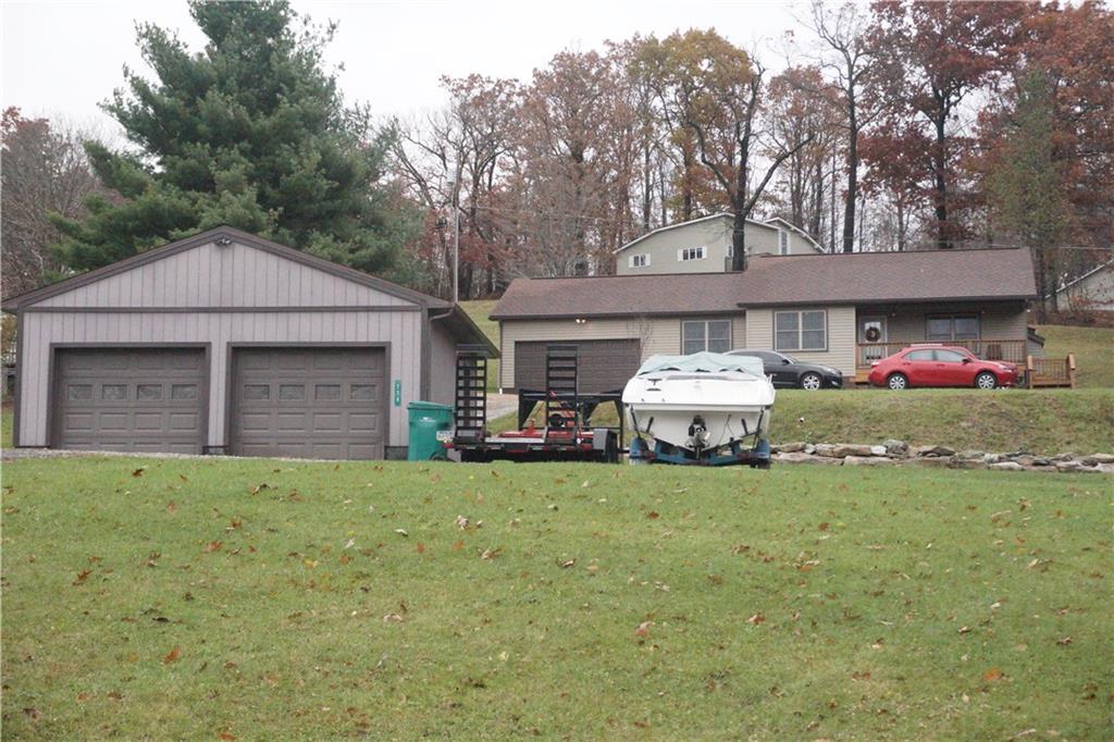 776 County Line Road Acme, PA 15610 - Photo 4 of 25 Front view of home and detached garage