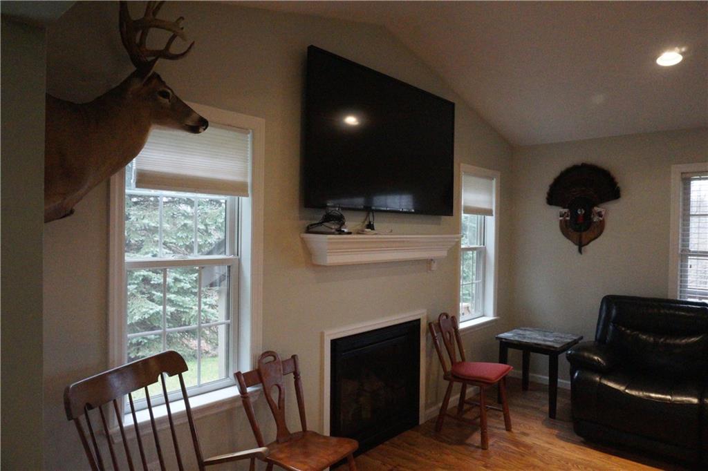 776 County Line Road Acme, PA 15610 - Photo 8 of 25 Propane fire place in living room